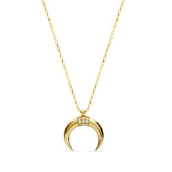 Feel like the queen of the universe with our our 14 karat gold Diamond Luna Pendant.  This gold pendant in shape of a moon features handset brilliant cut diamonds.
