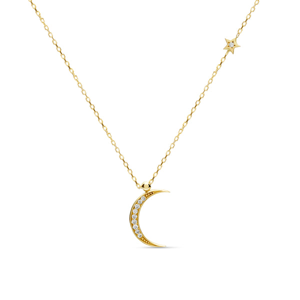 A magical 14 karat gold diamond necklace that will become your day to night companion. Moon magic diamond gold necklace.