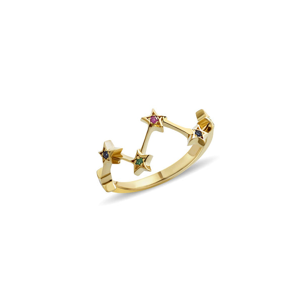 A 14 karat gold ring with handset gemstones. Our Multiple Star Ring is inspired by warm nights of star gazing. The emerald, sapphire and ruby stones add a playful glow to your hand. 