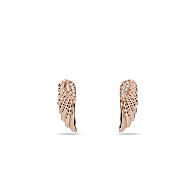 rosegold earrings. These magical and enchanting diamond earring studs are made of 14 karat gold with a handset diamond pavé. Inspired by the wings of a goddess, its glowing gold and diamonds will brighten your day. 