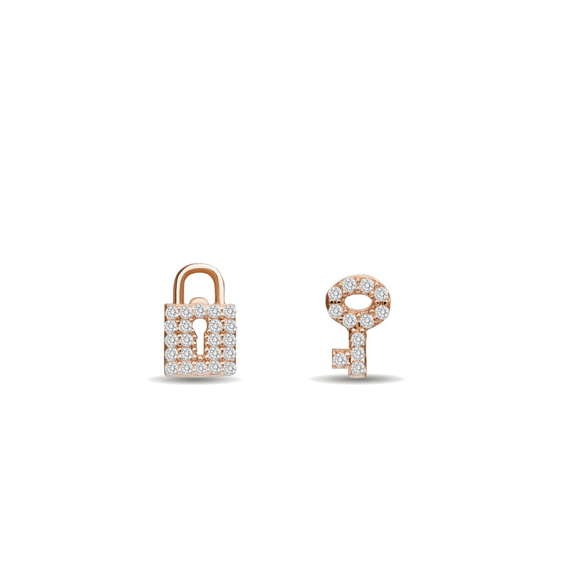 Our 14K gold diamond earring studs with a handset diamond pave are the ultimate love symbol. Lock and key diamond earrings rosegold.