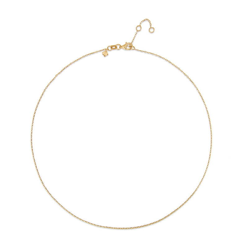 This fine 14 karat gold necklace is the ultimate statement of minimalism. It is the perfect gold necklace for women who love to layer jewels. 