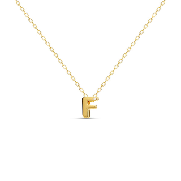 A 18 karat gold vermeil necklace with your initial letter "F". This diamond letter necklace is a special jewelry necklace that can be worn day and night. A genuine diamond stone in the corner of the letter makes this gold diamond necklace a luxury and ideal gift for yourself, your best friend or loved one. 