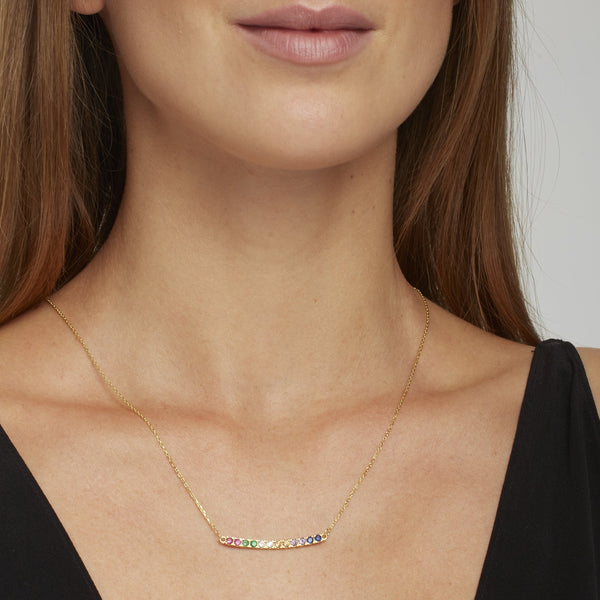 A fun and colorful necklace with a classic design. This necklace loves to be layered with other gold necklaces but is also a statement worn by itself. Team this necklace with the Rainbow Hoops.