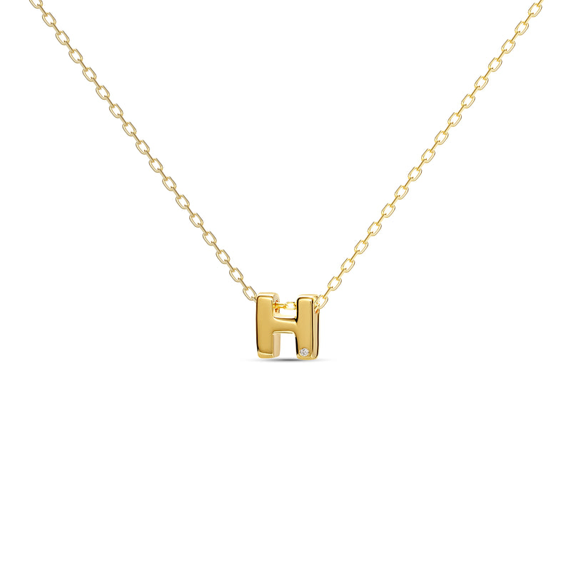 A 18 karat gold vermeil necklace with your initial letter "H". This diamond letter necklace is a special jewelry necklace that can be worn day and night. A genuine diamond stone in the corner of the letter makes this gold diamond necklace a luxury and ideal gift for yourself, your best friend or loved one.