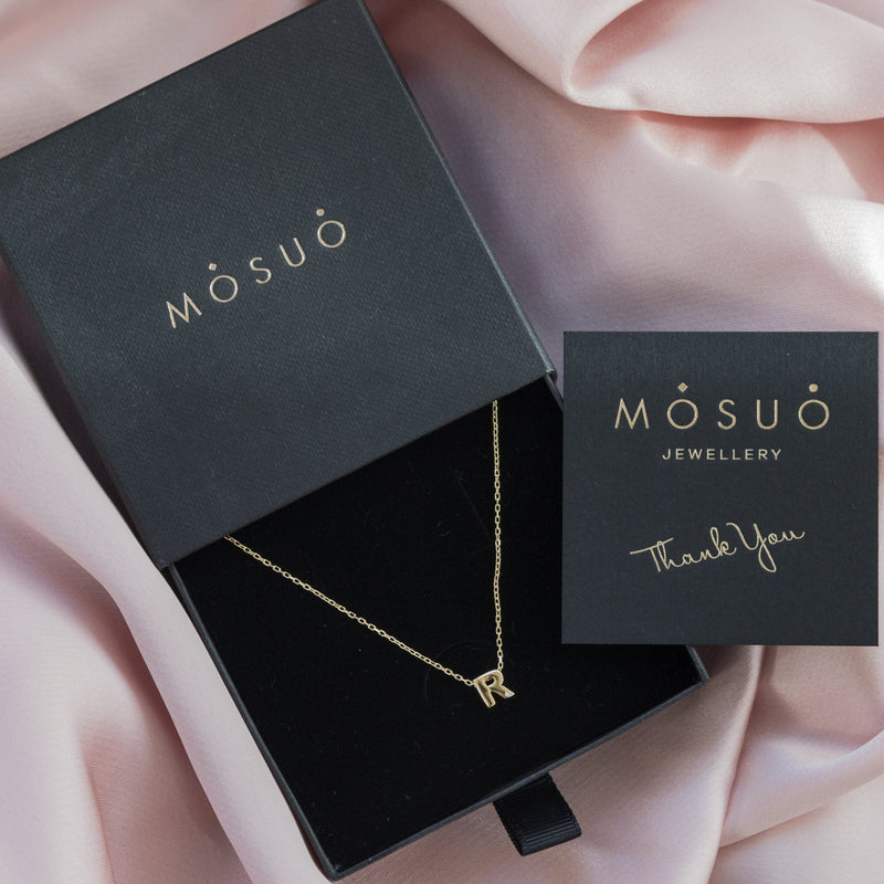 A 18 karat gold vermeil necklace with your initial letter "R". This diamond letter necklace is a special gold necklace that can be worn day and night. A genuine diamond stone in the corner of the letter makes this gold diamond necklace a luxury and ideal gift for yourself, your best friend or loved one. 