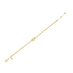 This handmade 14 karat gold bracelet is the ultimate gold accessory.  The bracelet features a double chain and a geometrical design, a pure gold triangle. Wear this bracelet on its own or team with our Triangle Necklace and Triangle Ring.