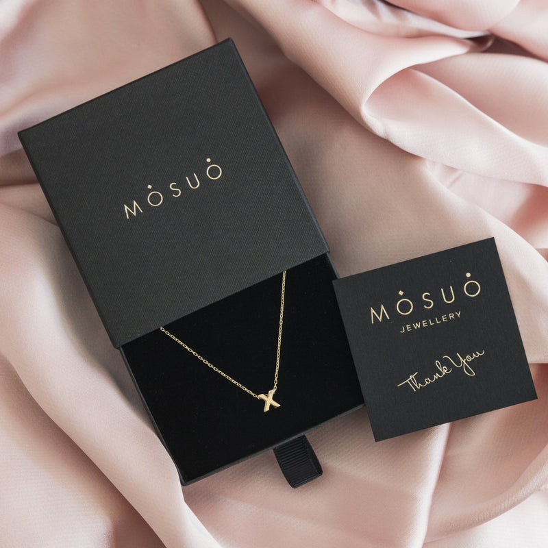 A 18 karat gold vermeil necklace with your initial letter "X". This diamond letter necklace is a special gold necklace that can be worn day and night. A genuine diamond stone in the corner of the letter makes this gold diamond necklace a luxury and ideal gift for yourself, your best friend or loved one.